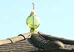 Sars-Poetries: glass ball on house roof