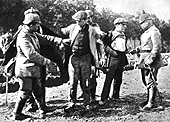 Civilians searched by German troops